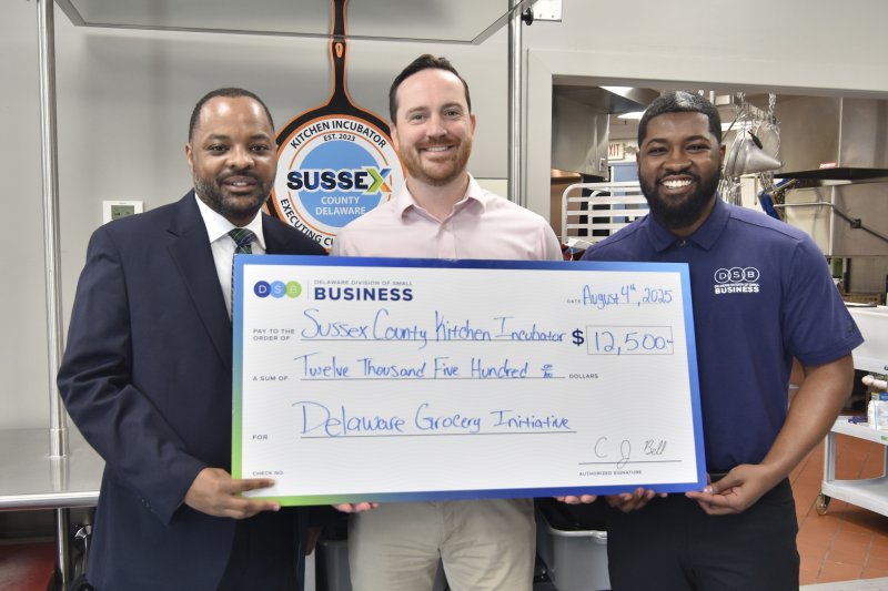 The Delaware Grocery Initiative presented a check Aug. 4, in the amount of $12,500 to the Sussex County Kitchen Incubator. Shown are (l-r) Sen. Darius Brown, Sussex County Economic Director Andrew Harton and Delaware Division of Small Business Director CJ Bell. SUBMITTED PHOTO